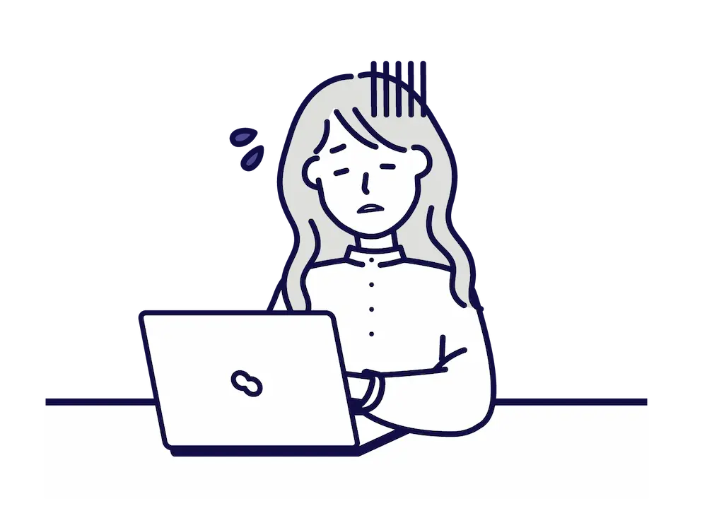 パソコンの前で困る女性のイメージ